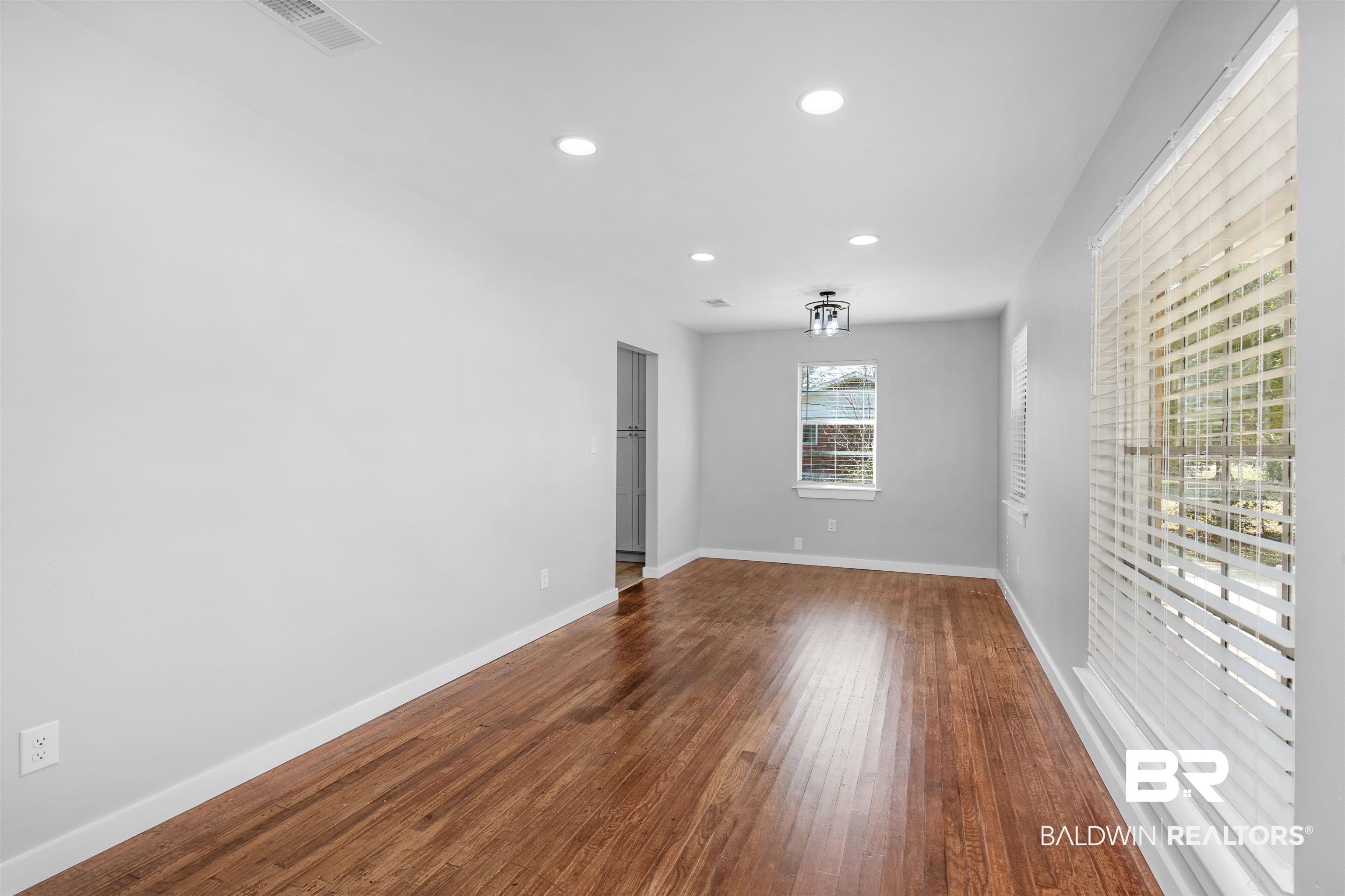 3005 Club House Road Mobile, AL 36605 - Photo 4 of 20 Spare room with wood-type flooring