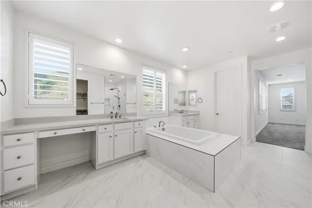 a view of a house with backyard and porch