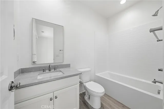 a view of a city with mountains in the background