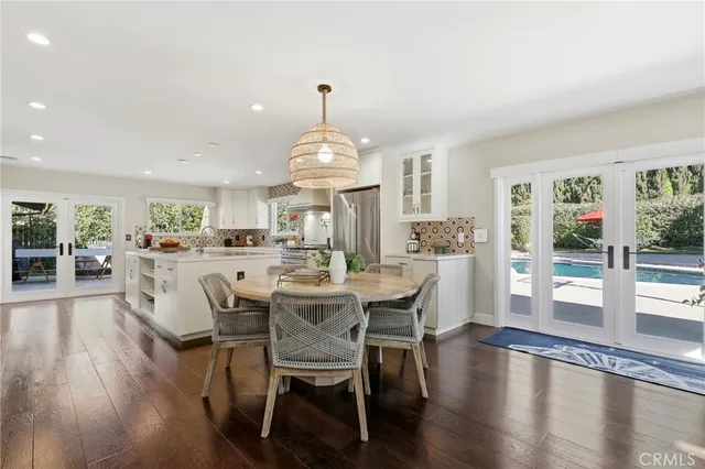 a living room with furniture a window and a fireplace