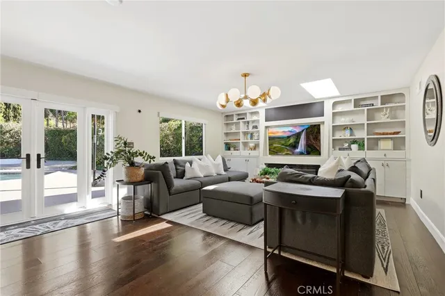 a bathroom with a double vanity sink mirror and shower