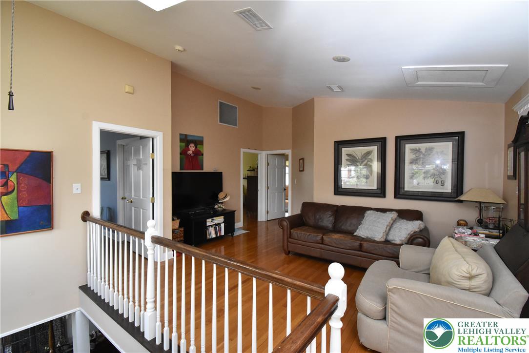 424 Grape Street Whitehall, PA 18052 - Photo 36 of 56 This inviting loft features warm hardwood floors, creating an atmosphere of comfort and relaxation.