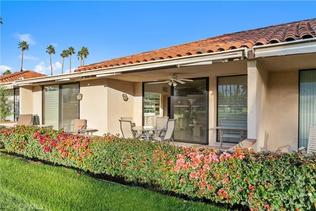 a outdoor space with lots of tables and chairs
