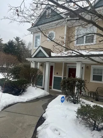 a front view of house with yard outdoor seating and barbeque oven