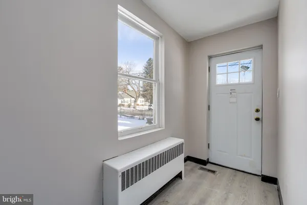 a view of an empty room and window