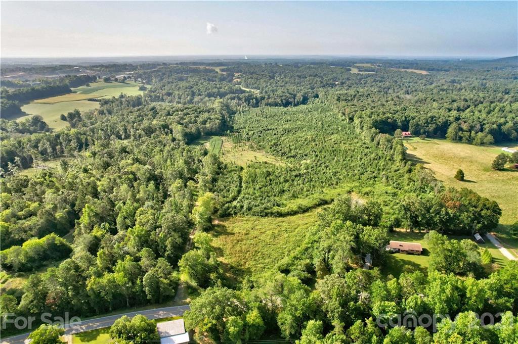 0 Cool Springs Road Cleveland, NC 27013 - Photo 20 of 23 an aerial view of residential houses with outdoor space and trees
