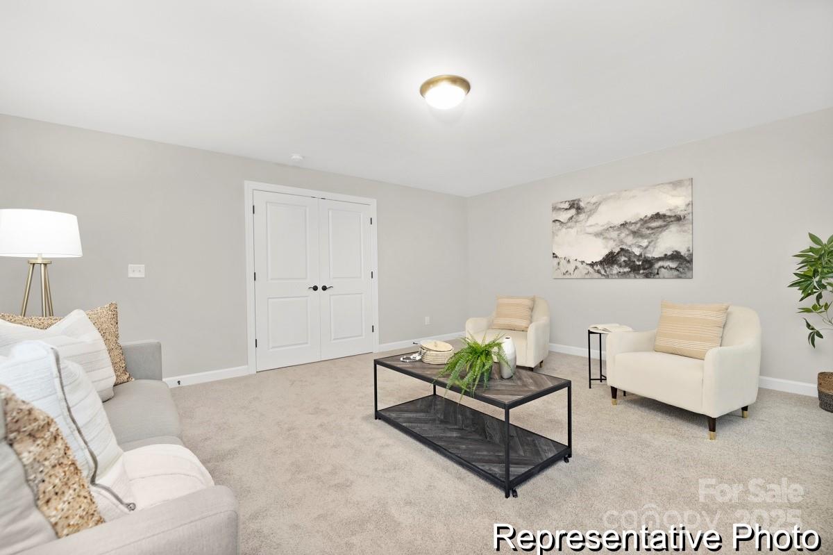 4114 McManus Road, Unit 1P Monroe, NC 28112 - Photo 24 of 37 a living room with furniture