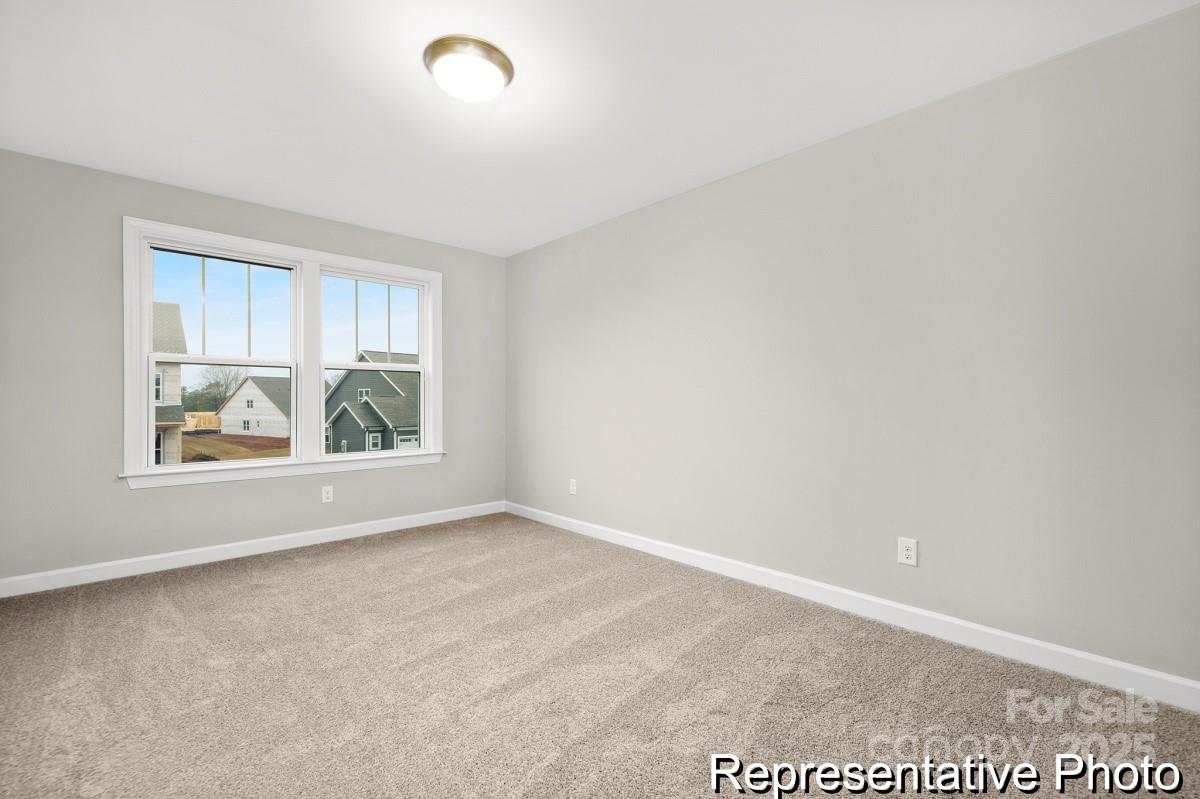 4114 McManus Road, Unit 1P Monroe, NC 28112 - Photo 26 of 37 a view of an empty room and window