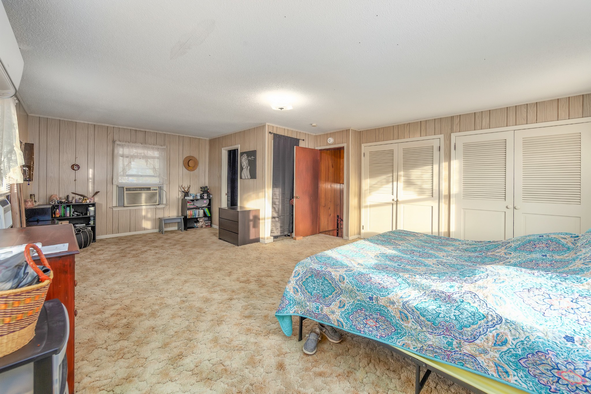 17 Old Henderson Road Pinson, TN 38366 - Photo 25 of 38 a bedroom with a bed closet and a large window