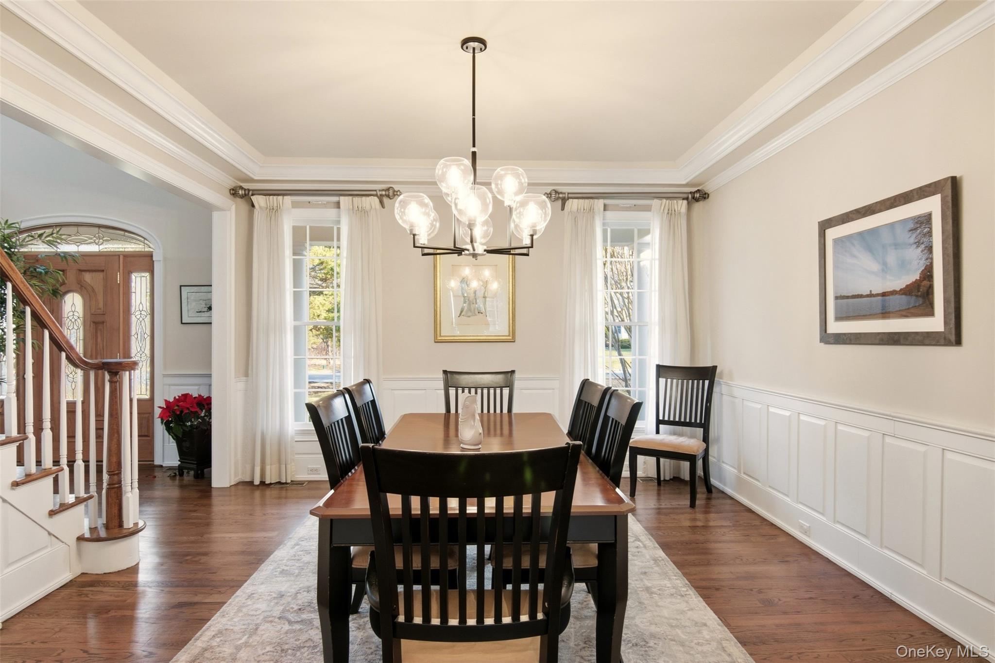 4 Daniel Way Setauket, NY 11733 - Photo 12 of 50 a view of a dining room with furniture window and wooden floor