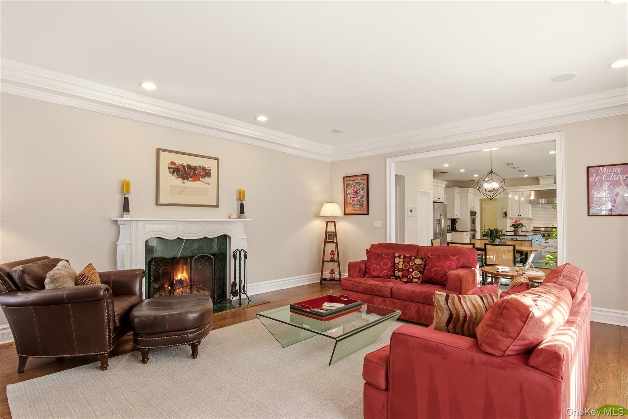 4 Daniel Way Setauket, NY 11733 - Photo 15 of 50 a living room with furniture and a fireplace