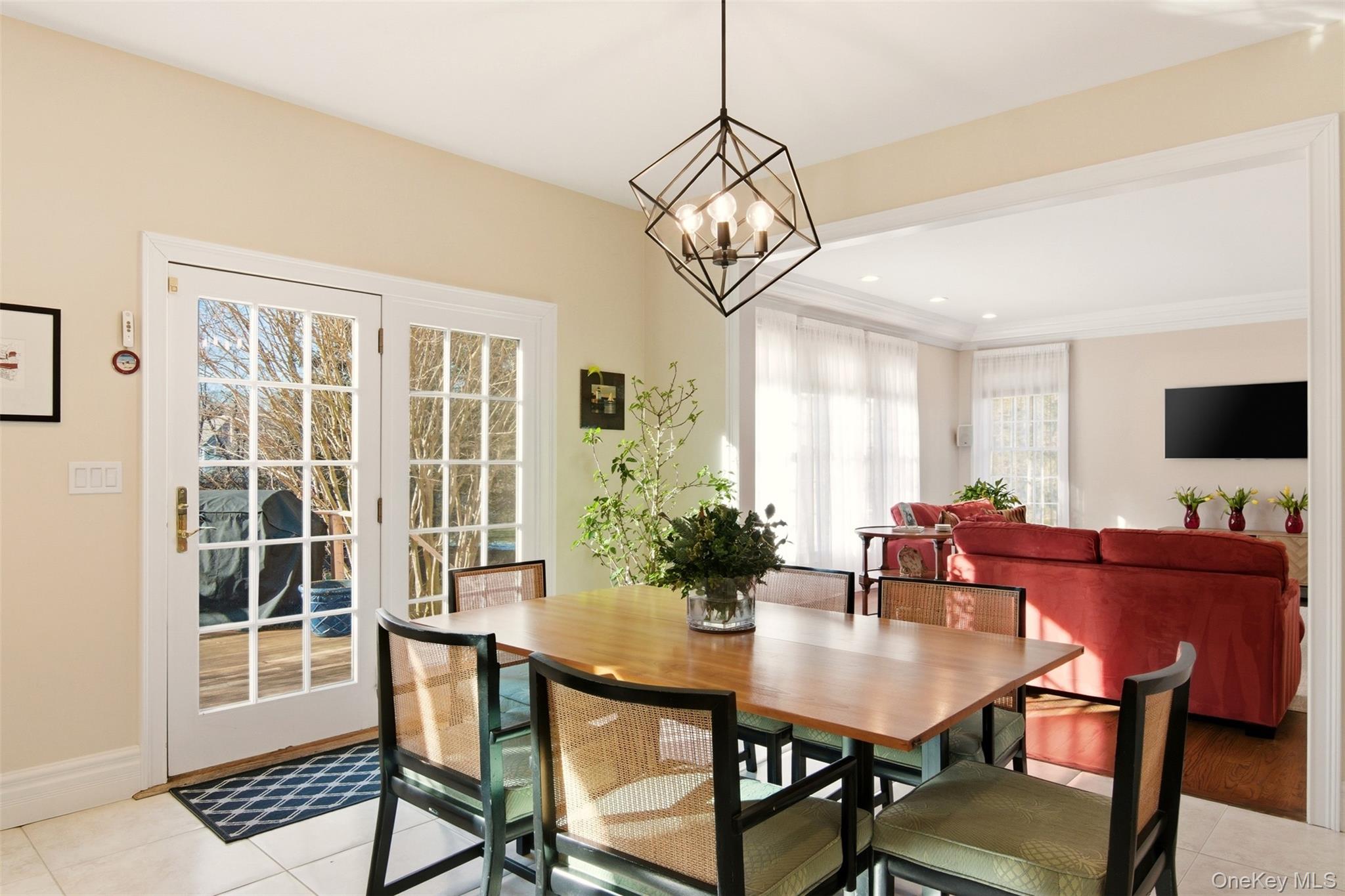 4 Daniel Way Setauket, NY 11733 - Photo 16 of 50 a view of a dining room with furniture window and wooden floor