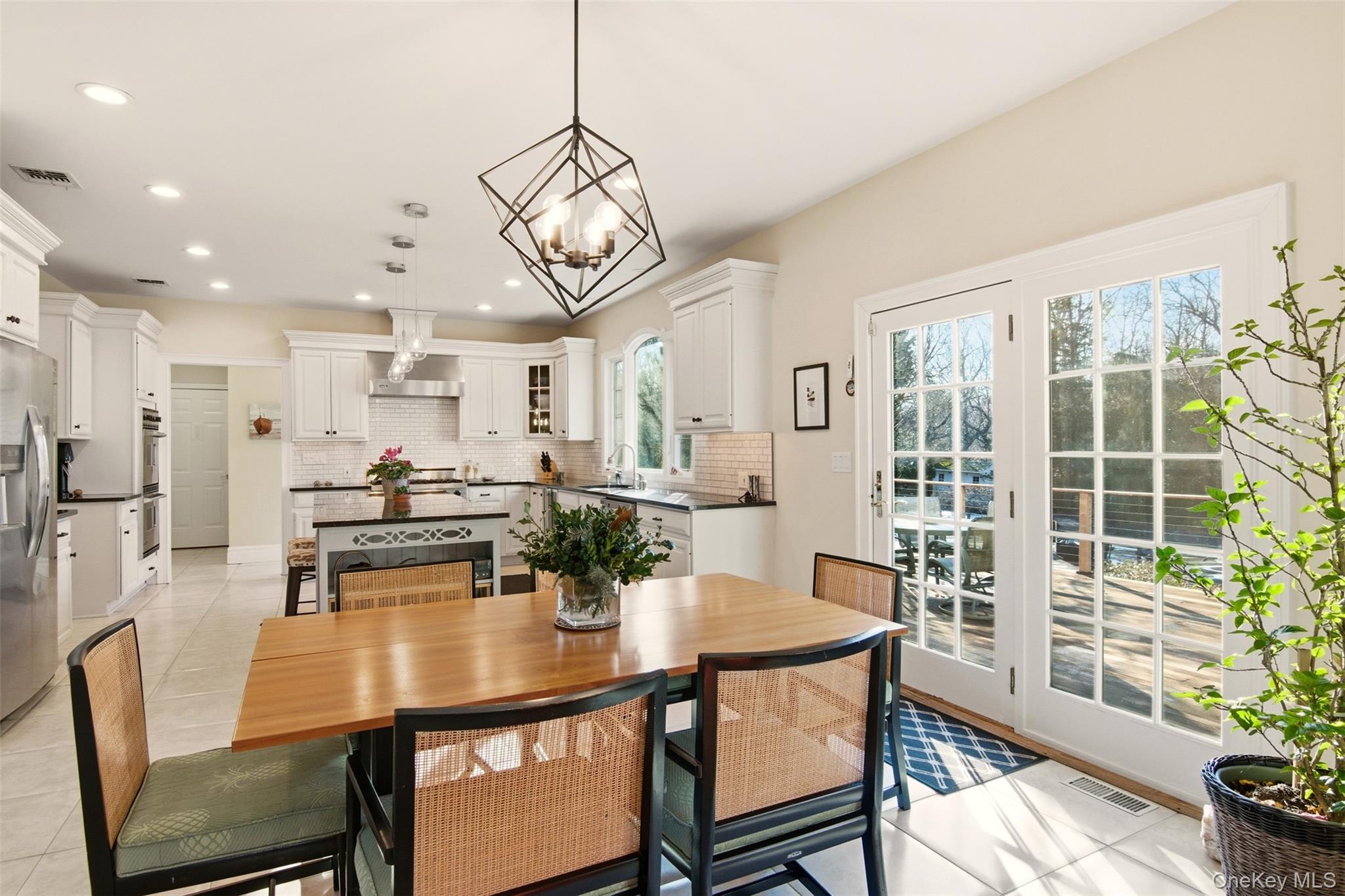 4 Daniel Way Setauket, NY 11733 - Photo 20 of 50 a view of a dining room with furniture window and wooden floor