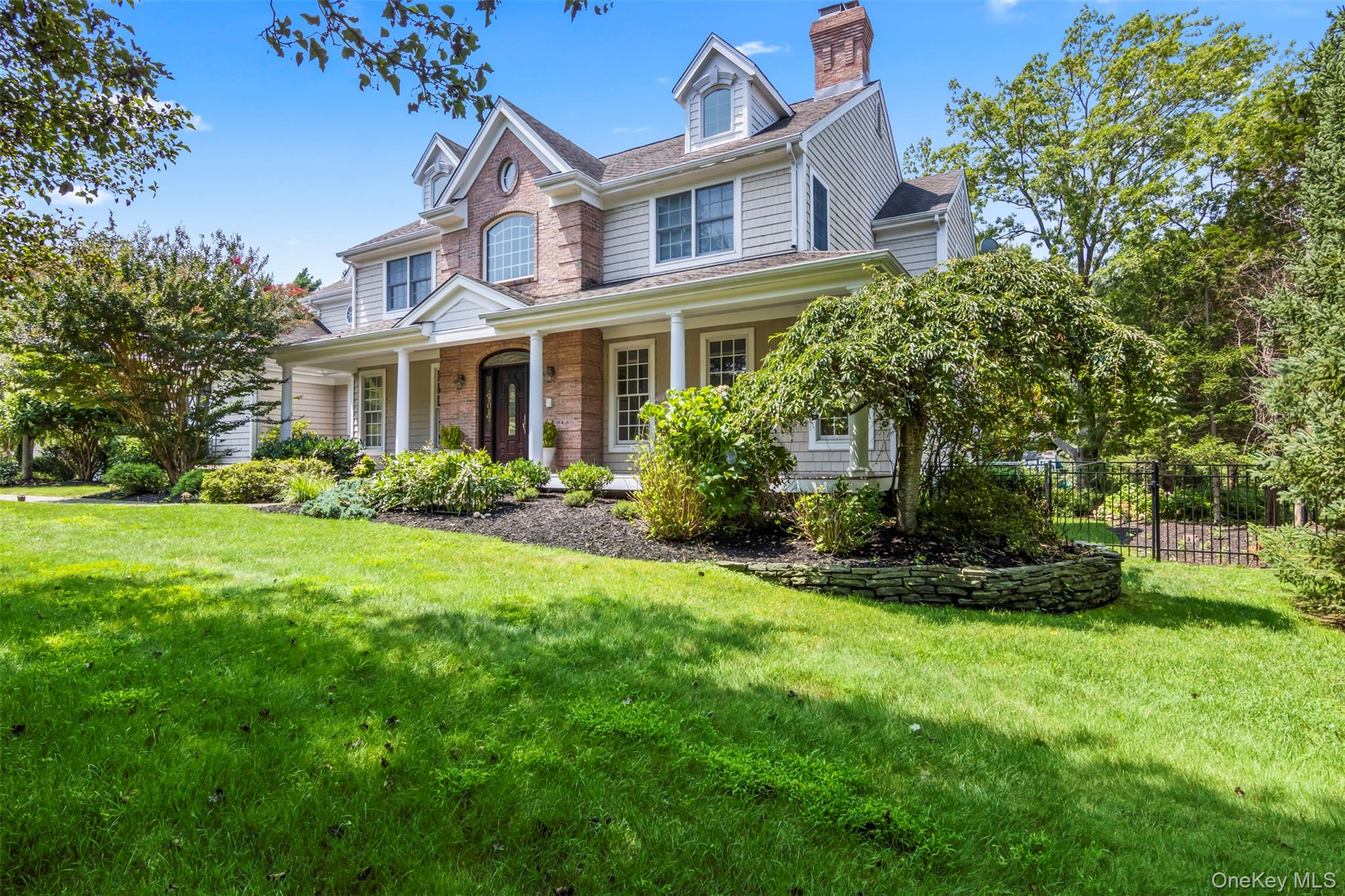4 Daniel Way Setauket, NY 11733 - Photo 2 of 50 a front view of house with yard and green space