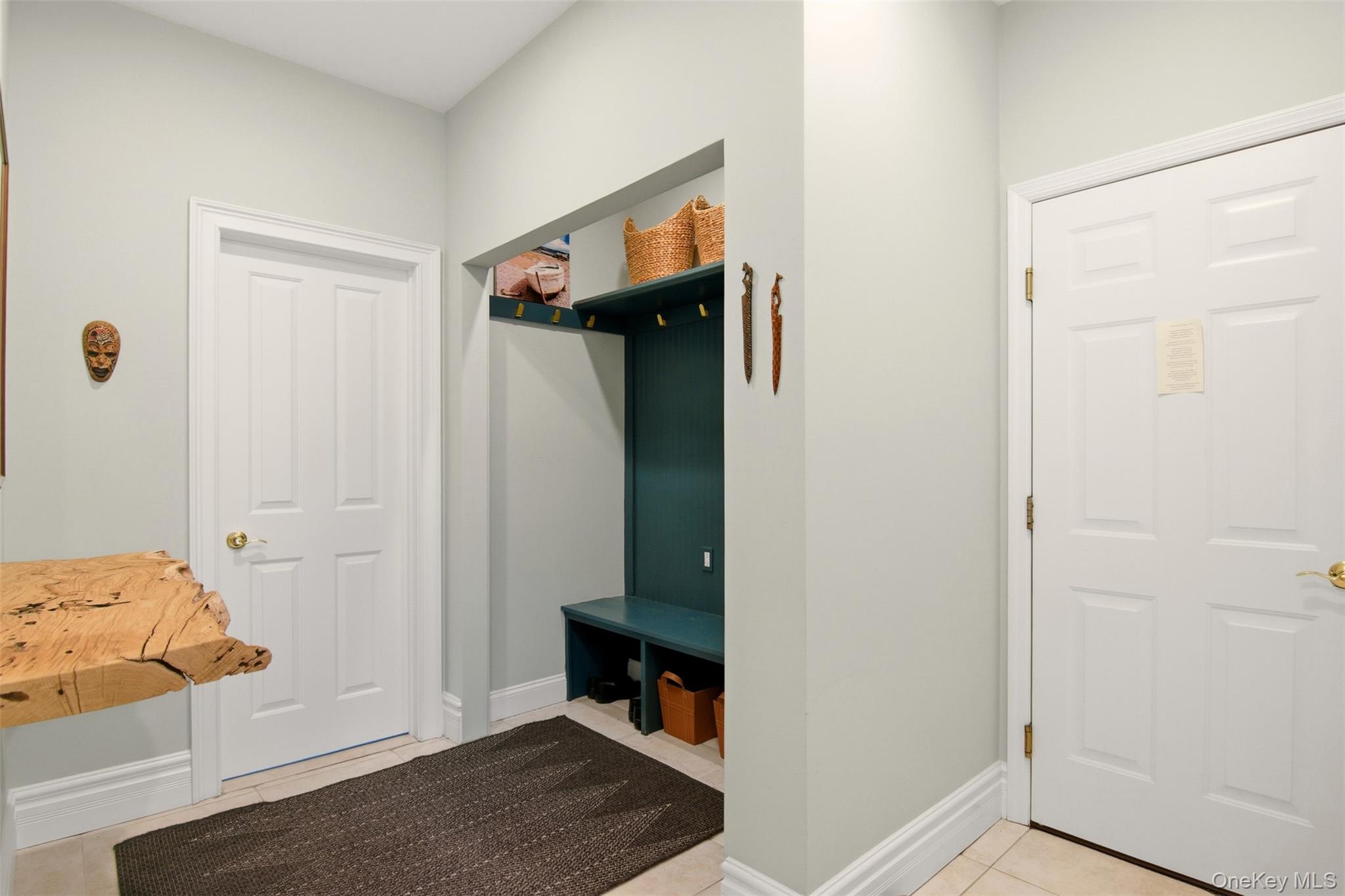 4 Daniel Way Setauket, NY 11733 - Photo 27 of 50 a view of hallway with livingroom and furniture
