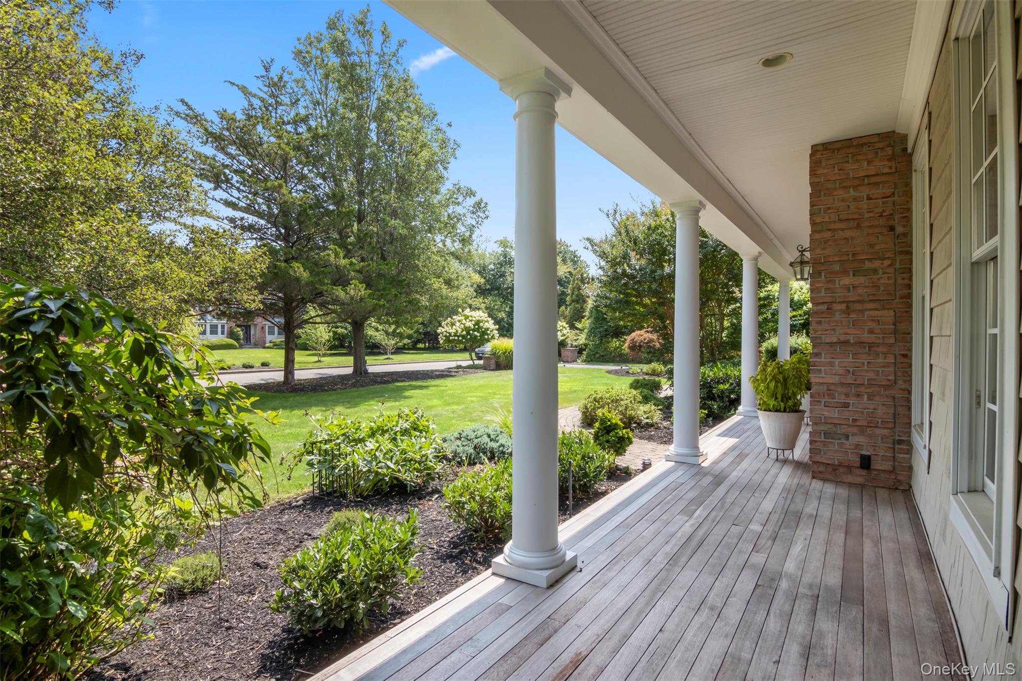 4 Daniel Way Setauket, NY 11733 - Photo 3 of 50 a view of a garden with pathway and a pathway