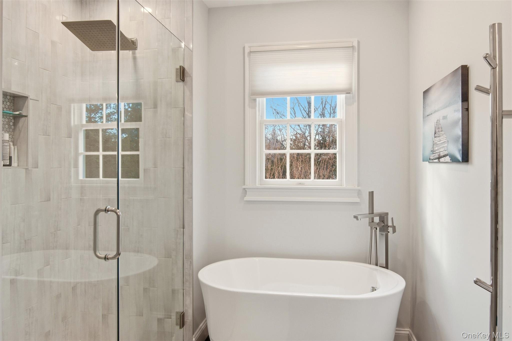 4 Daniel Way Setauket, NY 11733 - Photo 31 of 50 a bathroom with a bathtub and shower