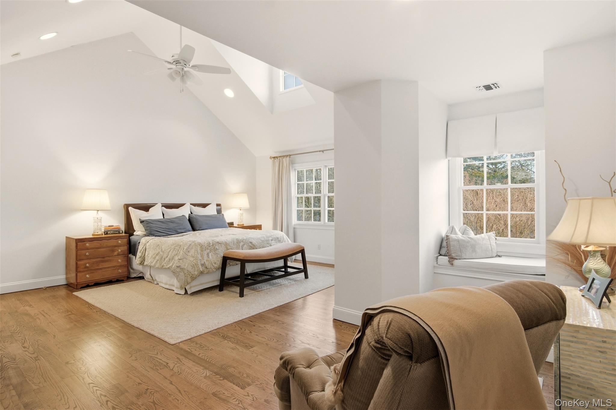 4 Daniel Way Setauket, NY 11733 - Photo 35 of 50 a bedroom with bed and a window