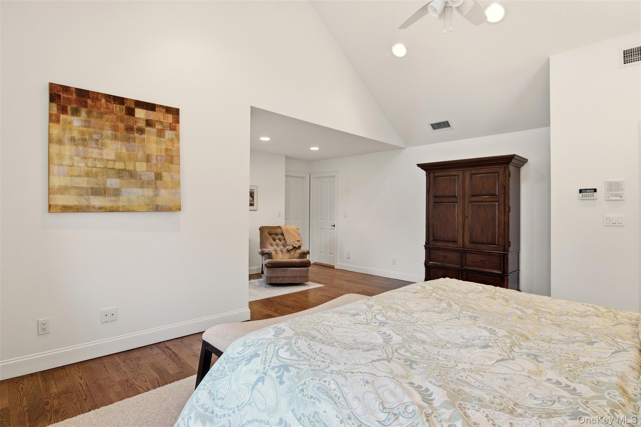 4 Daniel Way Setauket, NY 11733 - Photo 37 of 50 a bedroom with a bed and a couch
