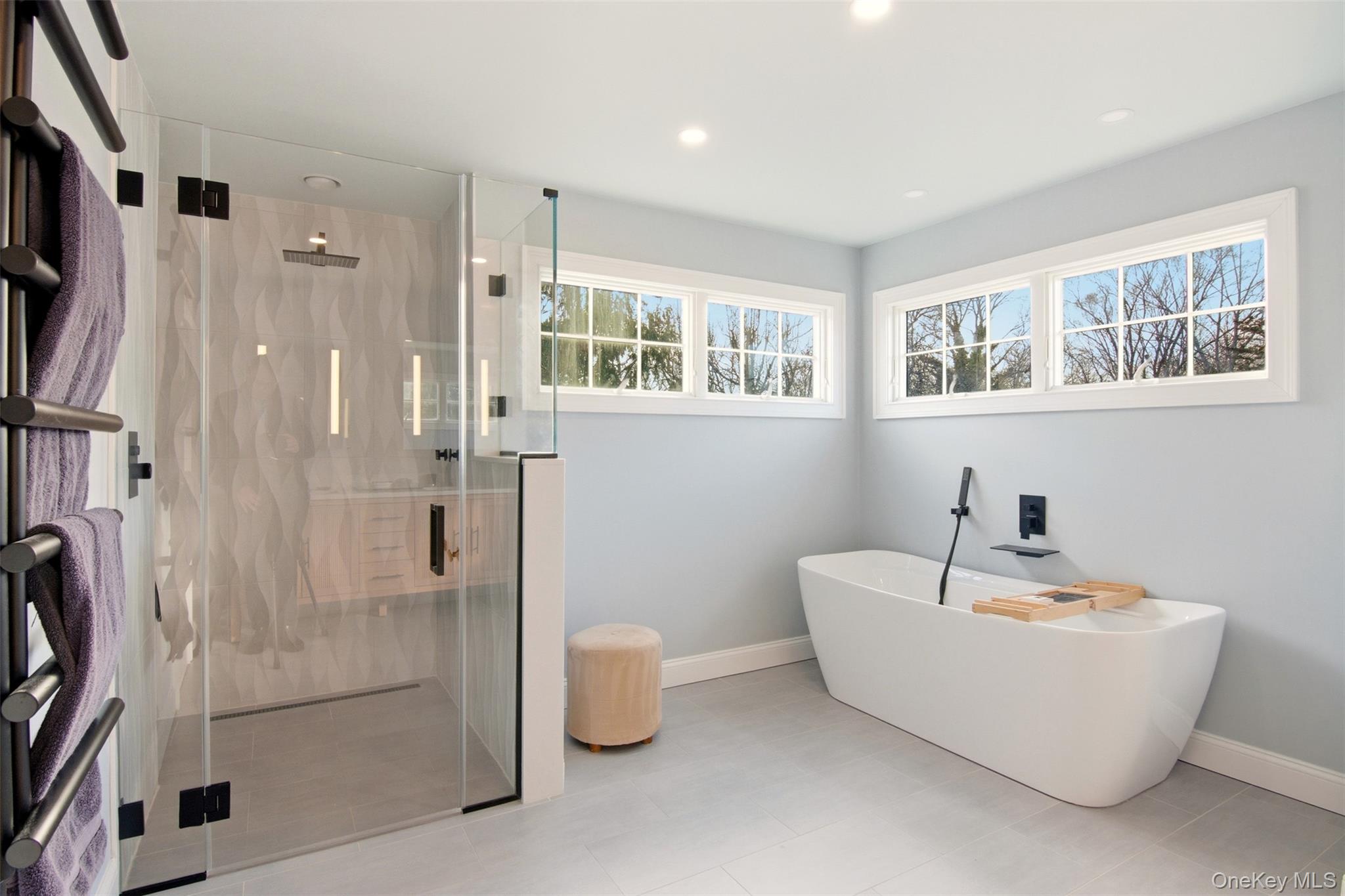 4 Daniel Way Setauket, NY 11733 - Photo 40 of 50 a bathroom with a bathtub and shower