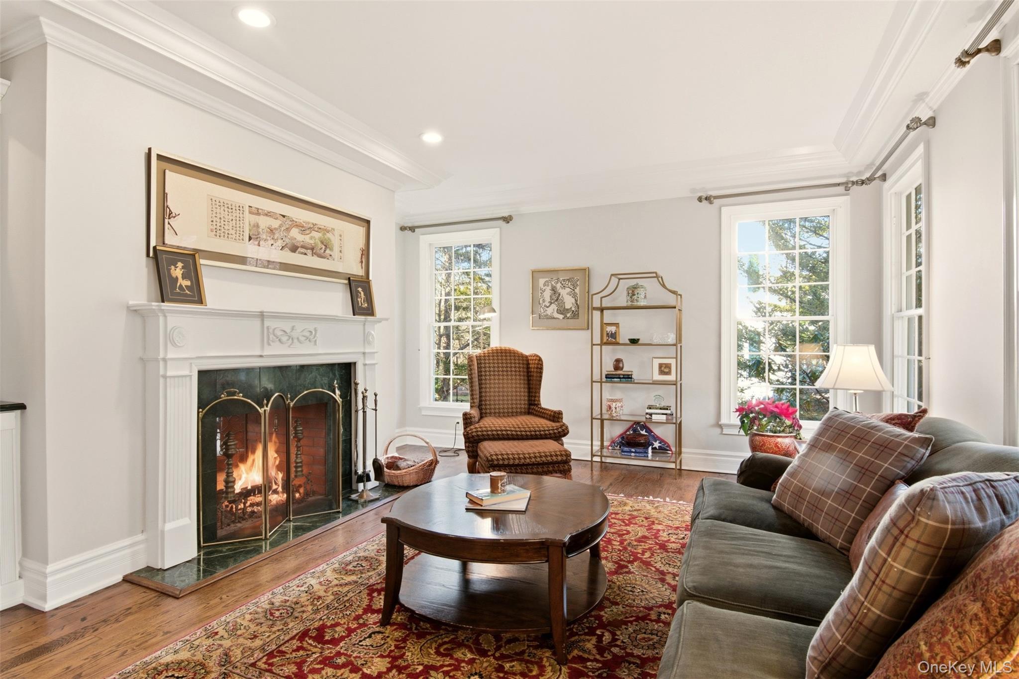 4 Daniel Way Setauket, NY 11733 - Photo 6 of 50 a living room with furniture a window and a fireplace