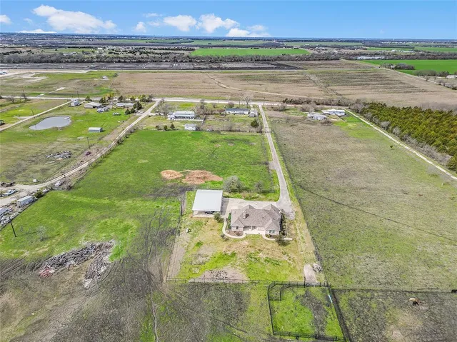 a view of a lake with a big yard