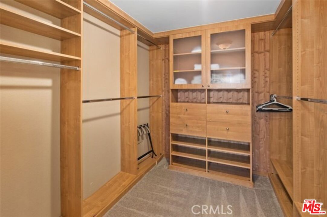 37200 Glen Oaks Road, Unit 3 Temecula, CA 92592 - Photo 16 of 25 a view of walk in closet with empty racks