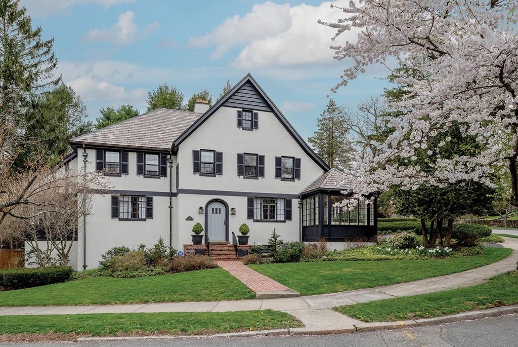 58 Randolph Road Brookline, MA 02467 - Photo 1 of 14 a front view of a house with a yard