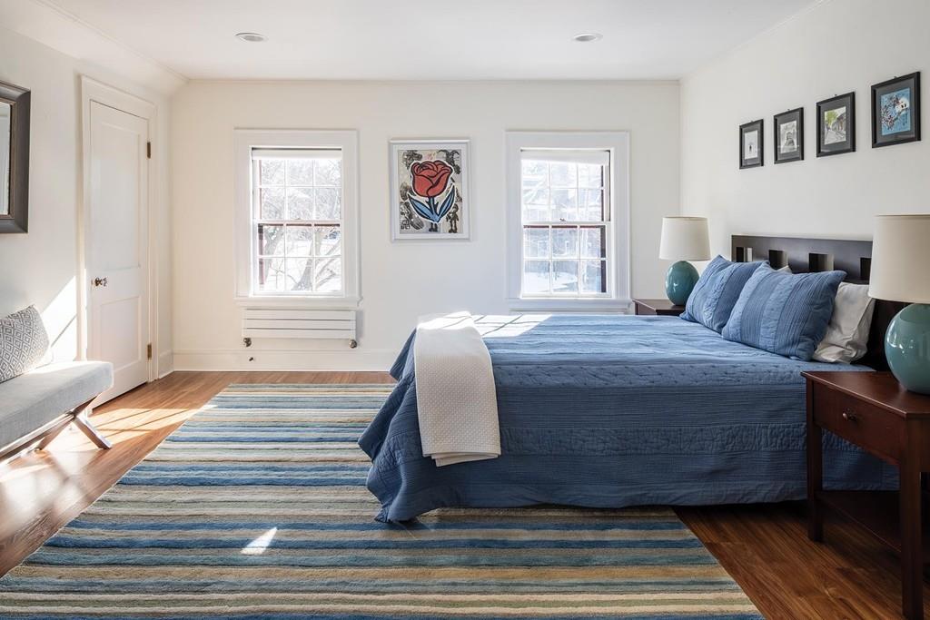 58 Randolph Road Brookline, MA 02467 - Photo 11 of 14 a bedroom with a bed and wooden floor