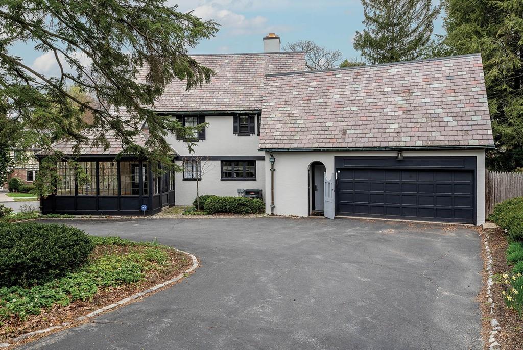58 Randolph Road Brookline, MA 02467 - Photo 14 of 14 a front view of a house with garden