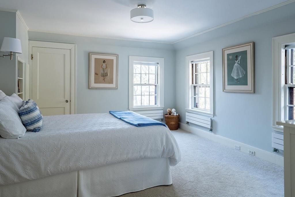 58 Randolph Road Brookline, MA 02467 - Photo 8 of 14 a bedroom with a bed and a window