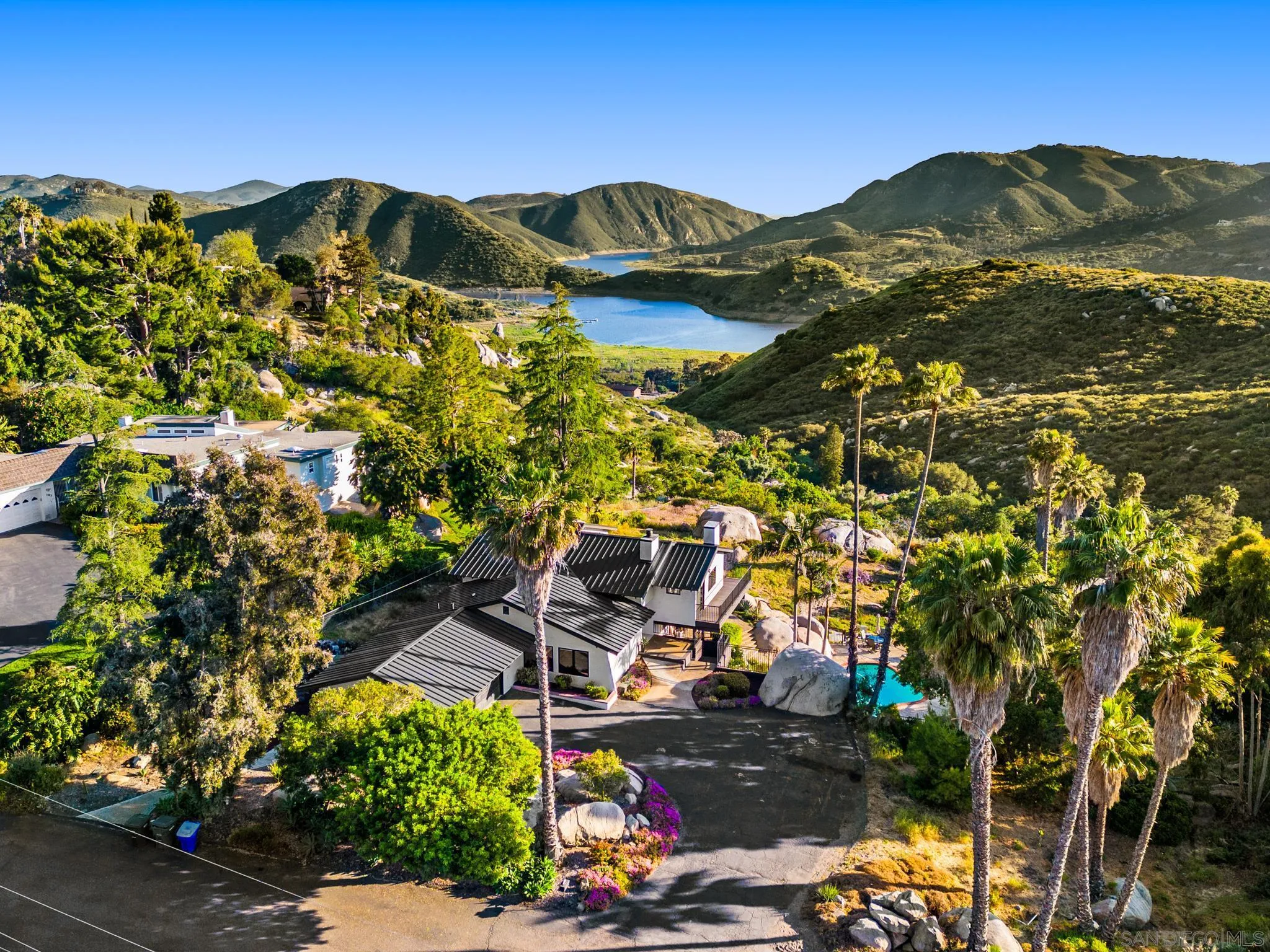1617 Skyhawk Road Escondido, CA 92029 - Photo 1 of 1 a view of a city with mountains in the background