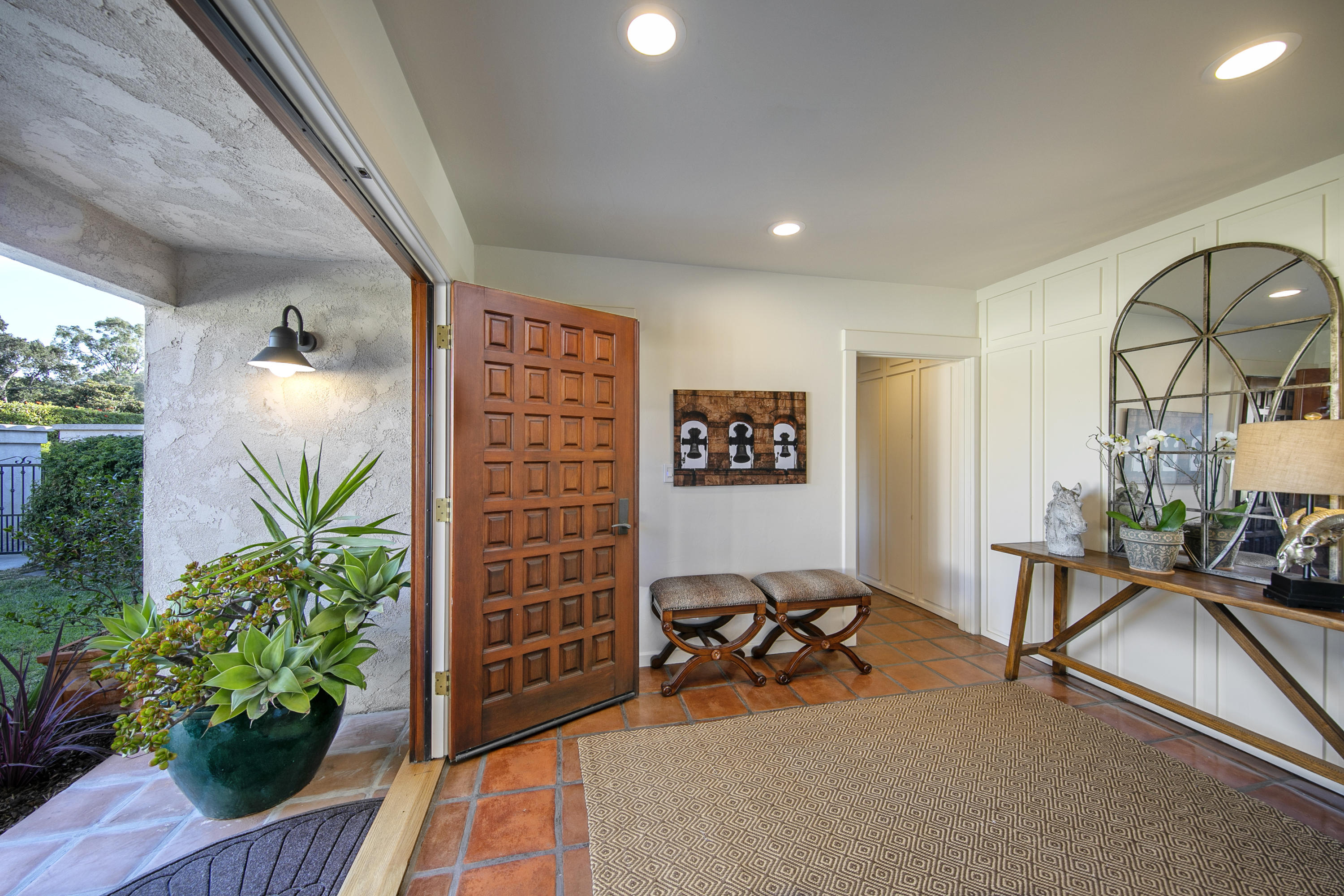 1025 Mission Ridge Road Santa Barbara, CA 93103 - Photo 4 of 10 a view of a livingroom with furniture and a potted plant