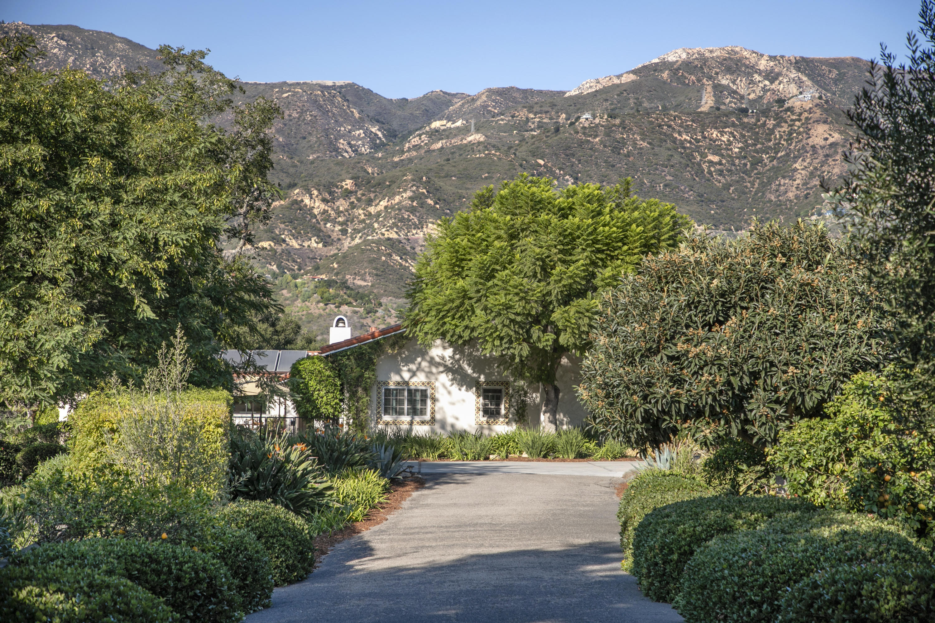 1025 Mission Ridge Road Santa Barbara, CA 93103 - Photo 10 of 10 a view of a yard and mountains