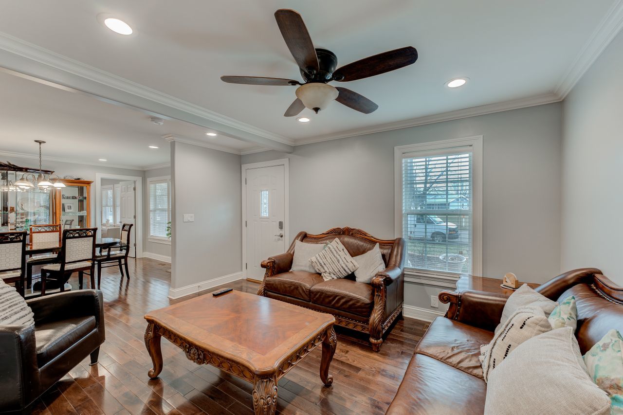 113 Saugatuck Road Montgomery, IL 60538 - Photo 14 of 19 a living room with furniture and a window