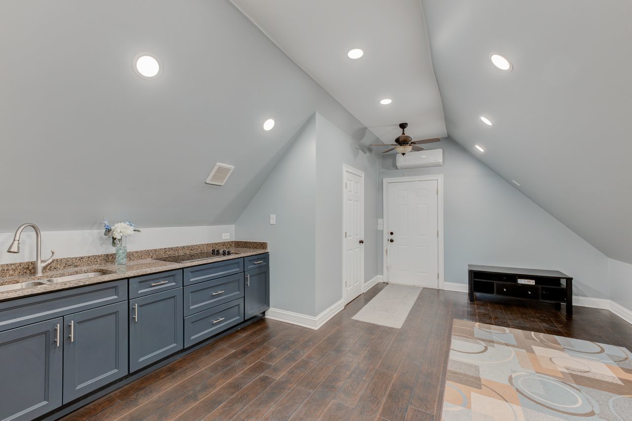 113 Saugatuck Road Montgomery, IL 60538 - Photo 15 of 19 a bathroom with a double vanity sink and a mirror