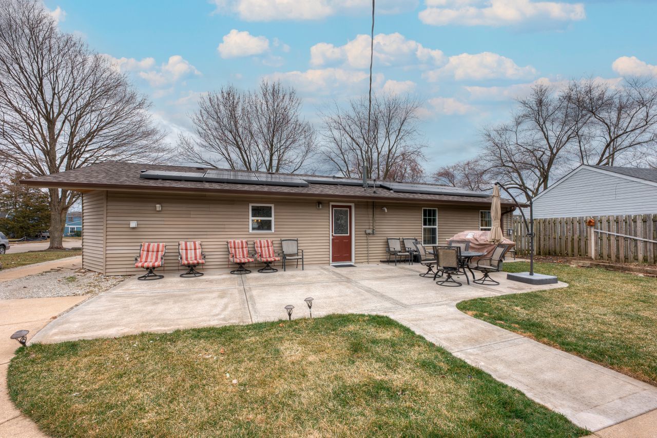 113 Saugatuck Road Montgomery, IL 60538 - Photo 18 of 19 a backyard of a house with seating space