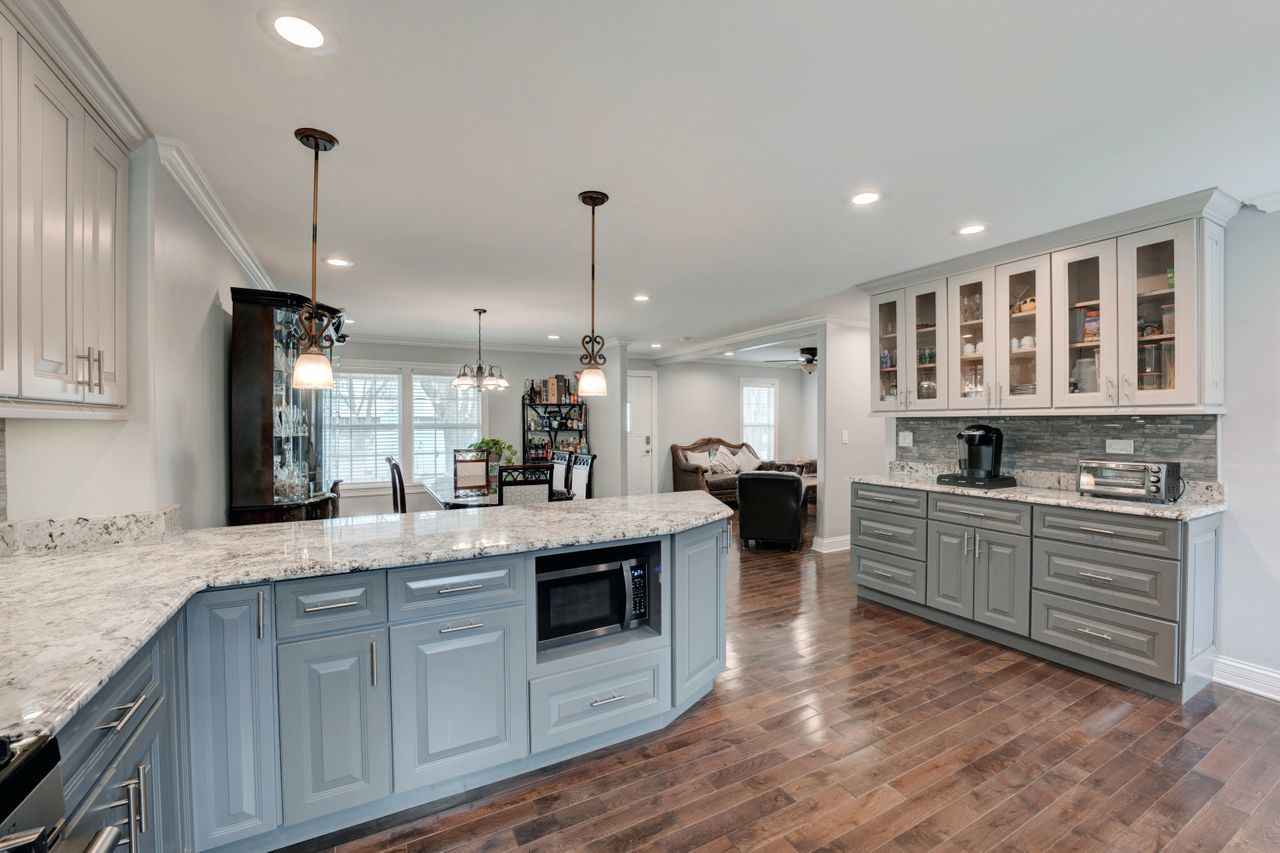113 Saugatuck Road Montgomery, IL 60538 - Photo 6 of 19 a kitchen with lots of counter top space and appliances
