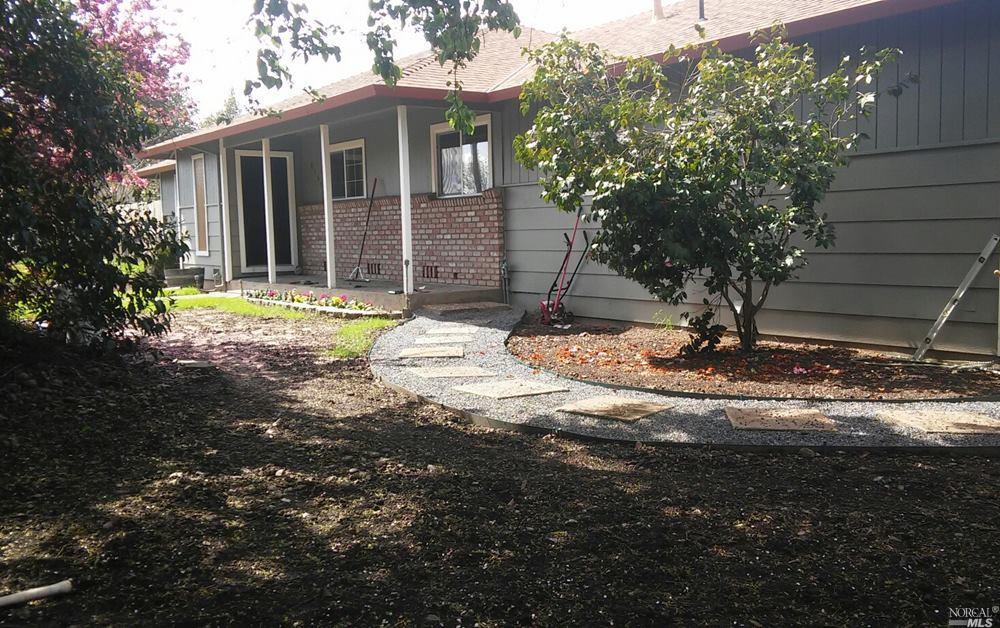 4151 Barnes Road Santa Rosa, CA 95403 - Photo 1 of 1 a view of a house with backyard and tree