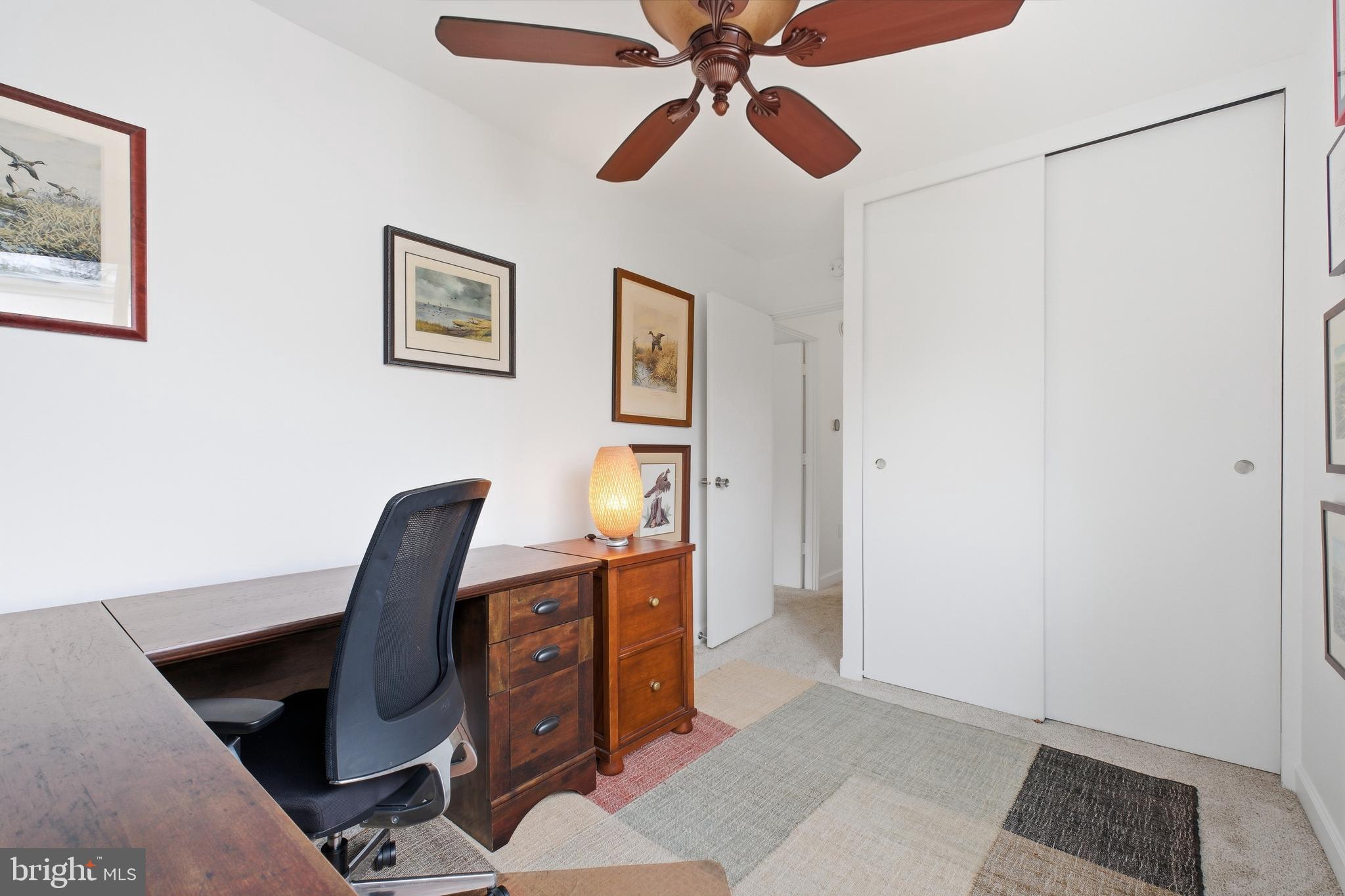 4848 Reservoir Road Northwest Washington, DC 20007 - Photo 26 of 49 a view of workspace with wooden floor and workspace