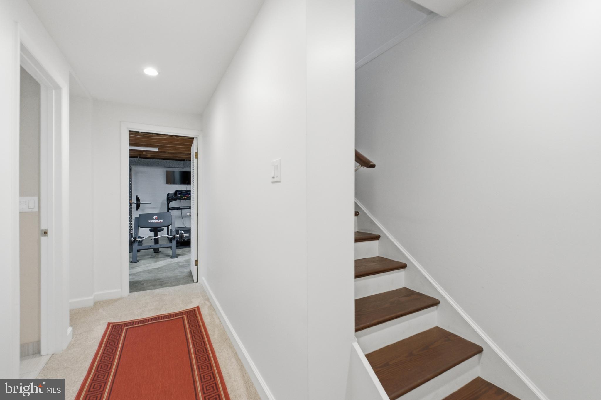 4848 Reservoir Road Northwest Washington, DC 20007 - Photo 27 of 49 a view of entryway with wooden floor