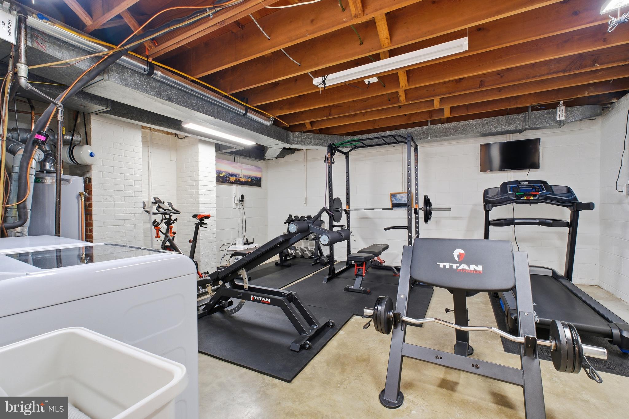 4848 Reservoir Road Northwest Washington, DC 20007 - Photo 32 of 49 a view of a room with gym equipment