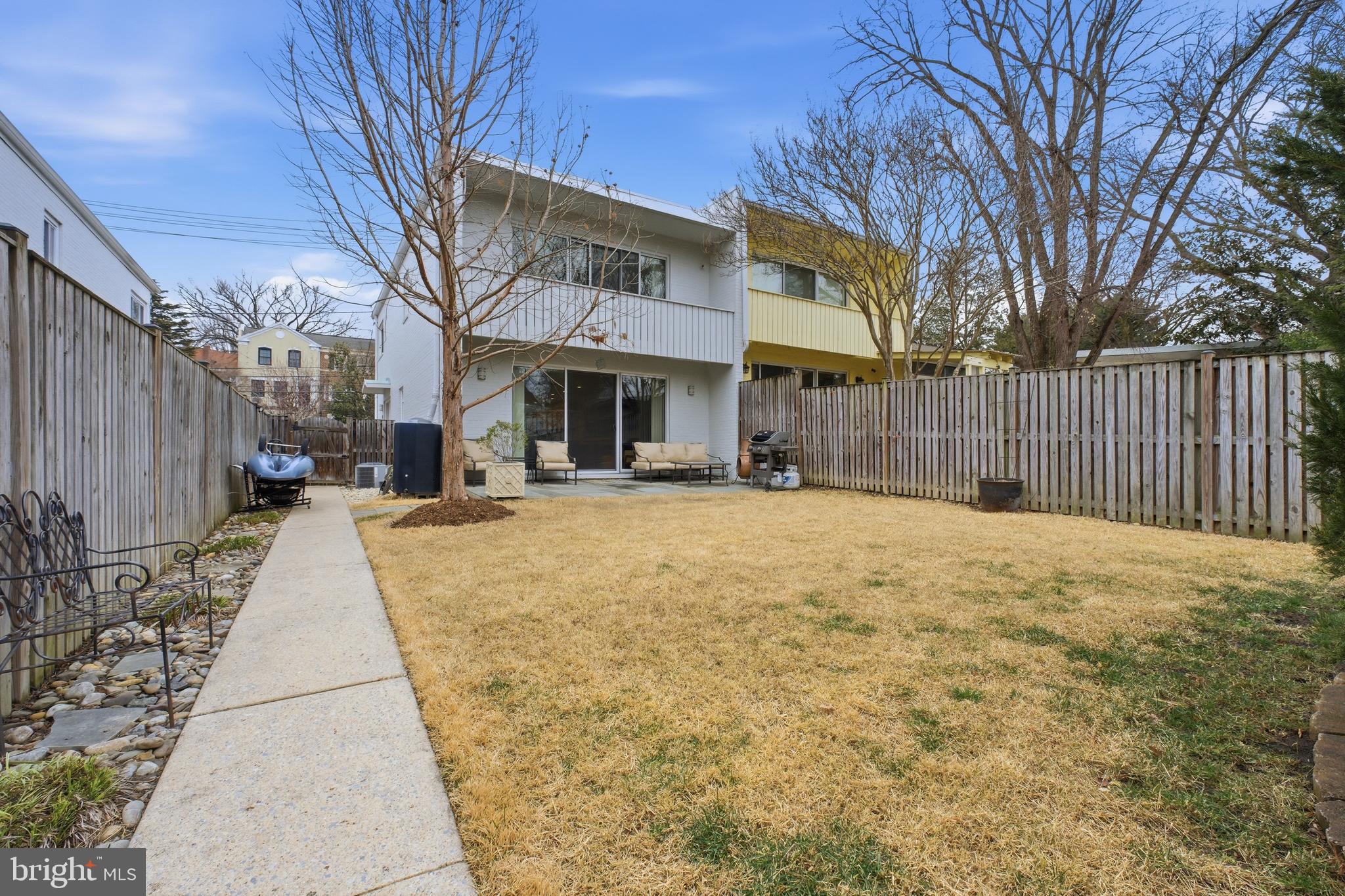 4848 Reservoir Road Northwest Washington, DC 20007 - Photo 40 of 49 a pathway of a house with a yard