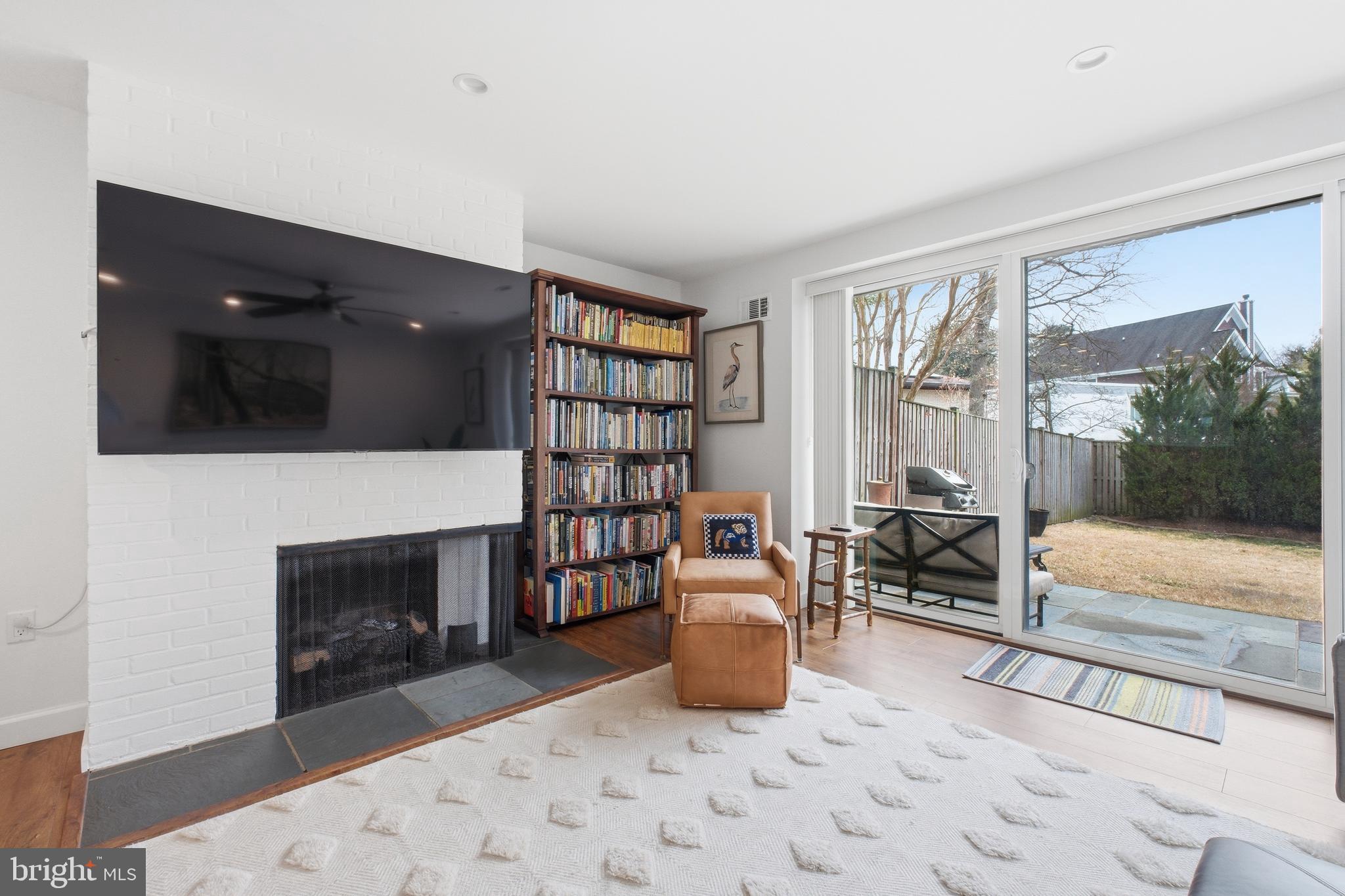 4848 Reservoir Road Northwest Washington, DC 20007 - Photo 4 of 49 a view of a livingroom with furniture and staircase