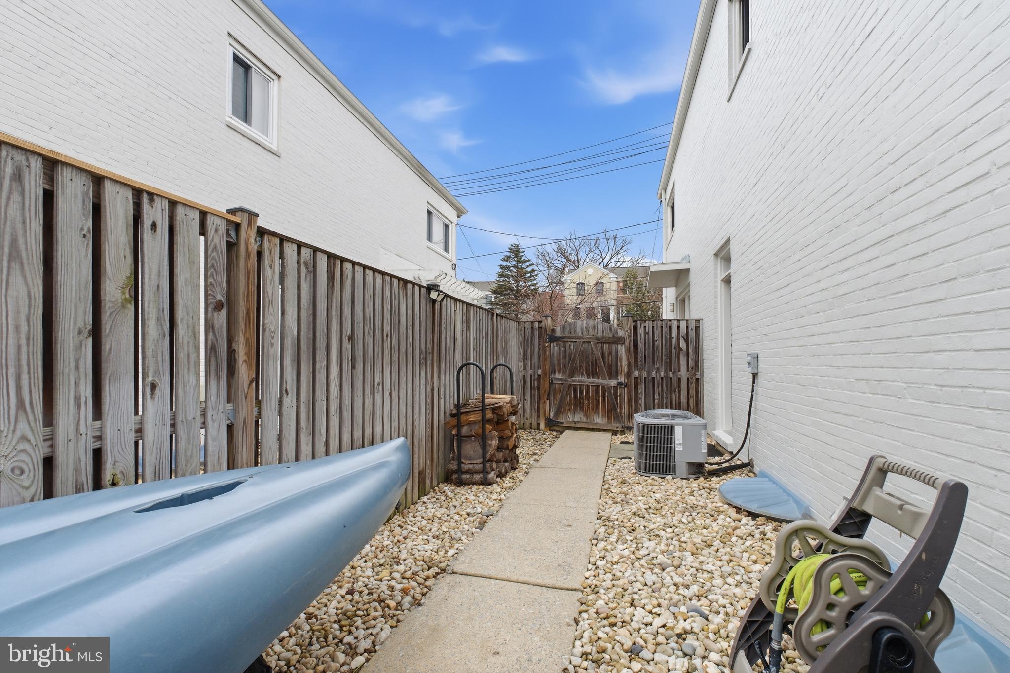 4848 Reservoir Road Northwest Washington, DC 20007 - Photo 41 of 49 a balcony with chairs and with potted plants