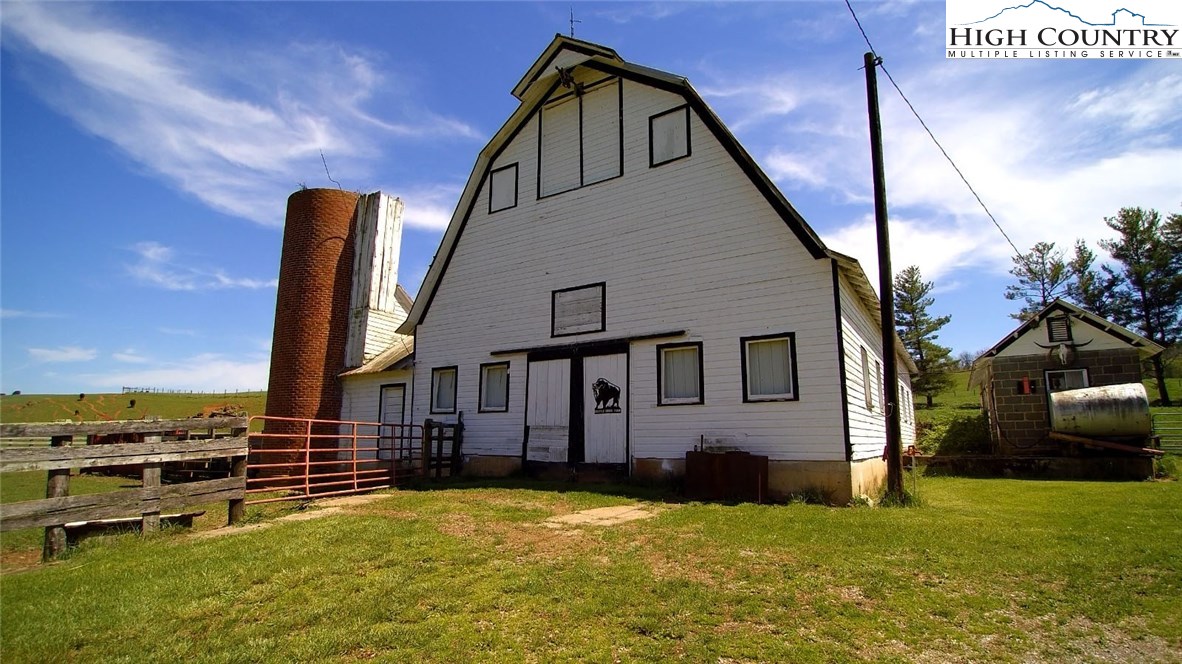 4513 Cedar Springs Road Speedwell, VA 24374 - Photo 2 of 49 a view of a house with a yard