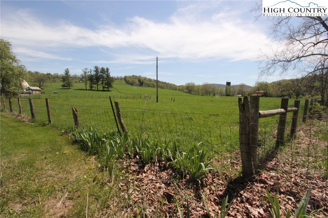 4513 Cedar Springs Road Speedwell, VA 24374 - Photo 46 of 49 a view of a lake with a big yard