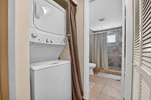 a view of bathroom with a toilet and a shower