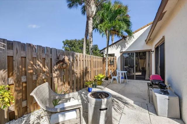 a view of outdoor kitchen and patio