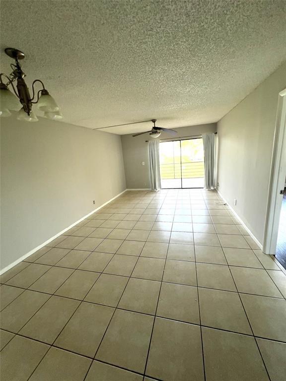 9273 Southwest 8th Street, Unit 216 Boca Raton, FL 33428 - Photo 6 of 7 a view of an empty room and window